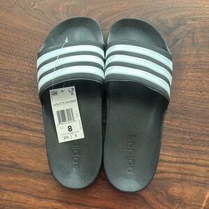 Men’s Adidas slides. Size 8. Never worn, tags attached.